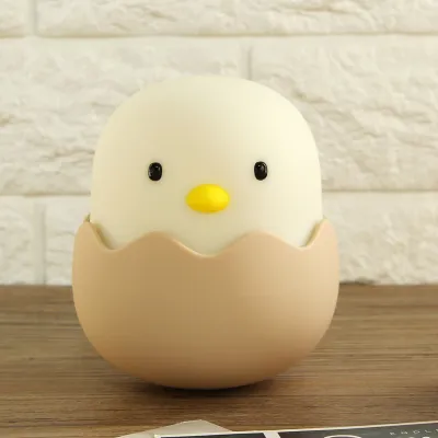 Immagine prodotto di Simpatica lampada notturna a LED ricaricabile a forma di pulcino in silicone, mini lampada da lettura (bianco caldo)