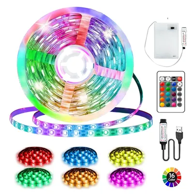 Immagine prodotto di Striscia LED a batteria, 3 metri, 90 LED RGB 5050. Alimentazione a batteria o tramite USB, con controllo remoto a 16 colori. Tagliabile, ideale per l'illuminazione dello sfondo della TV, della camera da letto, di armadi, per decorazioni di feste