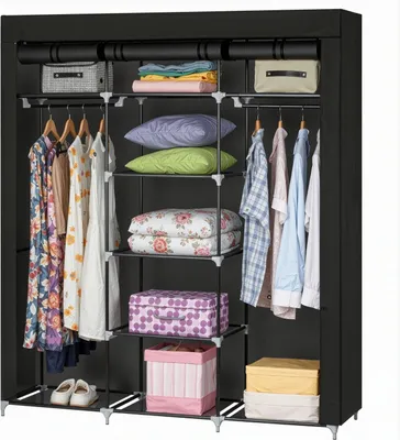 A black fabric wardrobe with clothes and accessories stored inside.