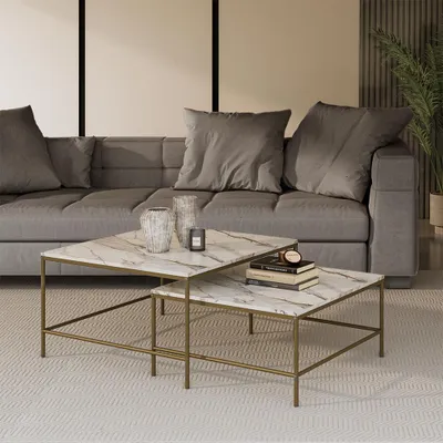 A living room scene with a couch and coffee tables.