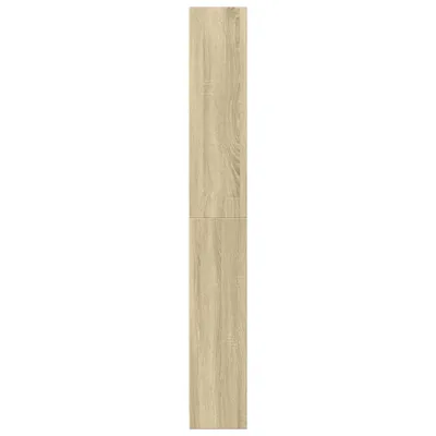 A tall, narrow, vertical image of a wooden shelf unit against a white background.