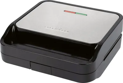 A closed black and silver sandwich maker on a white background.