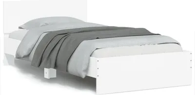 A white bed frame with gray and light gray bedding is shown against a white background.