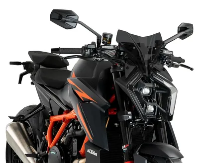 Immagine prodotto di Cupolino PUIG naked sport fumè scuro 285x285mm per Ktm