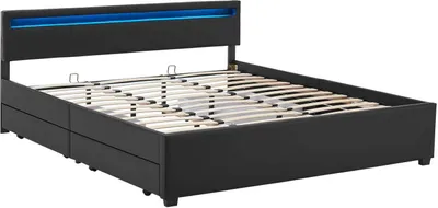 A black upholstered bed frame with a slatted base and a blue LED light strip on the headboard.