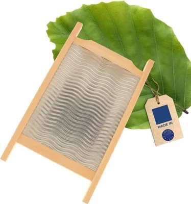A wooden washboard with a green leaf and a 'Made in EU' tag.