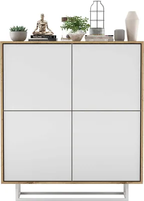 A modern sideboard with white doors and a wood-tone frame, decorated with various objects on top.