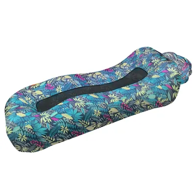 A single inflatable lounger with a floral pattern on a white background.