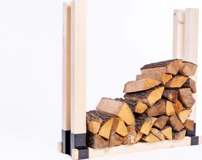 A firewood rack with stacked firewood against a white background.
