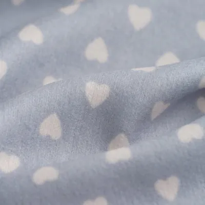 Imagen del producto de Tejido de punto tipo jersey, viscosa, estampado de corazones, color azul