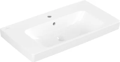 A white ceramic sink with a rectangular basin and a single faucet hole.
