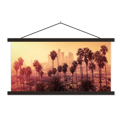 Produktbild von MuchoWow® Textilposter Palme - Skyline - Sonnenuntergang - Architektur 150x75 cm mit schwarzem Rahmen - Posterleiste