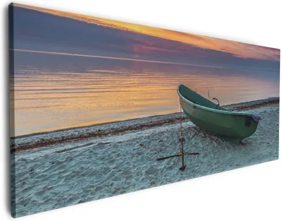 Produktbild von Wallario Premium Leinwandbild Einsames Fischerboot mit Anker am Strand in Größe 80 x 200 cm