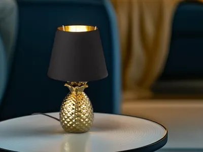 Produktbild von LED Tischleuchte Ananas aus Keramik mit Stofflampenschirm Ø20cm in Gold/Schwarz