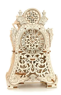 A wooden mechanical clock model on a white background.