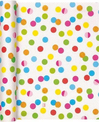 A roll of table runner with a polka dot pattern.