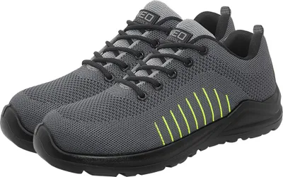 A pair of gray work shoes with black laces and soles, and yellow accents on the side.