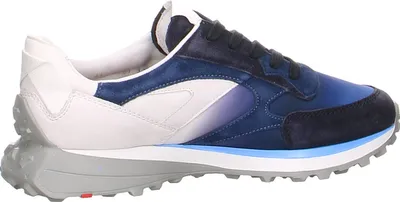 A side view of a blue and white sneaker.
