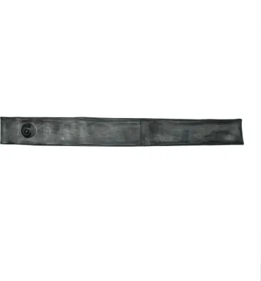 A long, thin, dark gray object, possibly a bicycle inner tube, is laid out horizontally against a white background. It has a small circular detail on the left end.