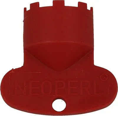 A red plastic tool with the brand name 'NEOPERL' embossed on it.