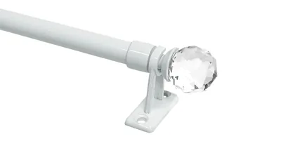 A close-up, studio shot of a white metal curtain rod with a faceted crystal finial.