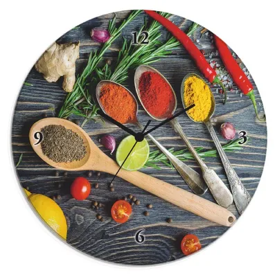 A circular clock face with a food-themed design, featuring spices in spoons and fresh ingredients.
