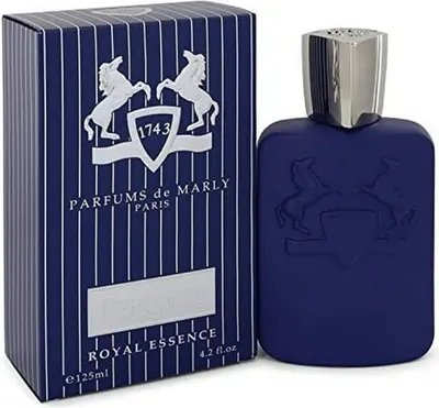 A product shot of a blue perfume bottle and its packaging.