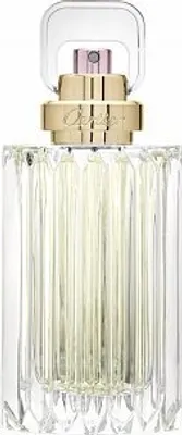 A close-up studio shot of a perfume bottle.