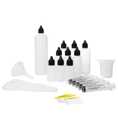 A collection of plastic bottles, syringes, a funnel, and a beaker arranged on a white background.