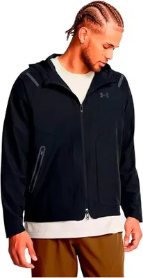 A man wearing a black Under Armour jacket.