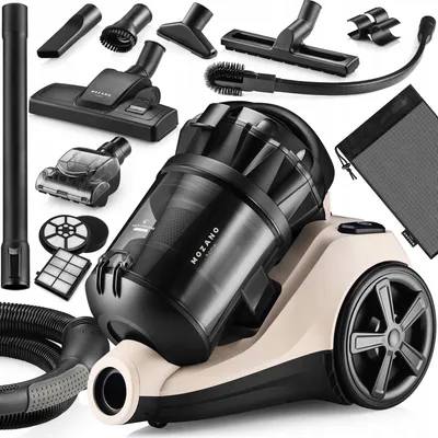 A collection of vacuum cleaner parts and accessories are laid out on a white background.