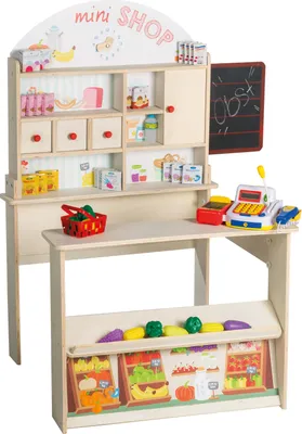 A wooden toy shop counter with various toy food items, a toy cash register, and a chalkboard.
