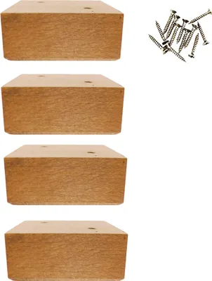 Four wooden furniture feet and a pile of screws are arranged on a white background.
