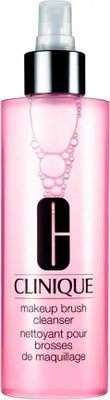A bottle of Clinique makeup brush cleanser.