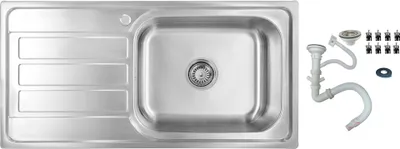A stainless steel kitchen sink with a drainboard and accessories laid out next to it.