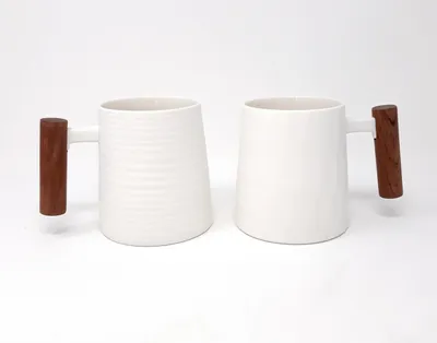 Produktbild von 2er Set Becher Blanca für 320ml weiß Porzellan mit Rosenholzgriff  TeaLogic