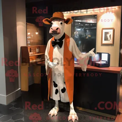 Produktbild von Maskottchen REDBROKOLY einer rostfarbenen Guernsey-Kuh mit Smoking und Umhang