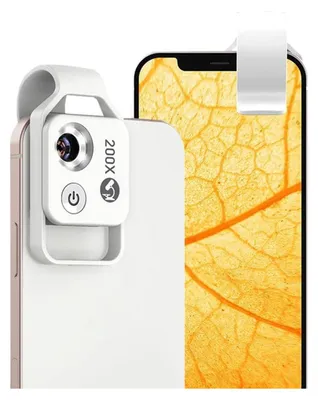 A close-up of a smartphone with a clip-on microscope attachment.