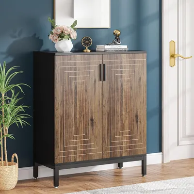 A shoe cabinet is shown in a hallway next to a door and a plant.