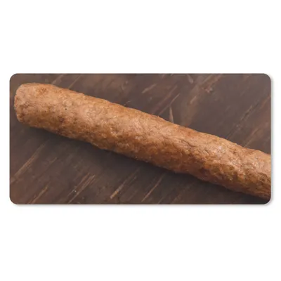 Produktbild von MuchoWow® Schreibtischunterlage Ein leckerer Frikandel auf einem hölzernen Hintergrund 80x40 cm - XXL Mauspad - Gaming Mauspad