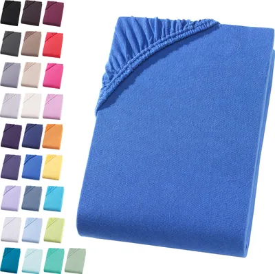 A blue fitted sheet is shown folded on a white background, with a grid of smaller swatches of different colored fitted sheets to the left.