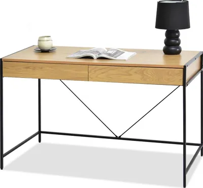 A desk with a lamp and a book on it.