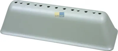 A light gray washing machine part with multiple holes on the top.