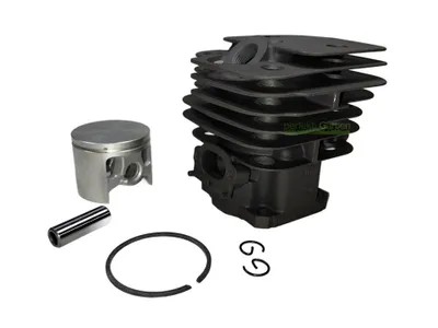 A set of engine parts, including a cylinder and piston, laid out on a white background.