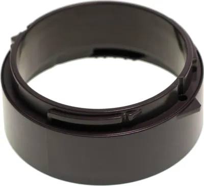 A dark brown plastic ring, likely a part of a kitchen appliance.