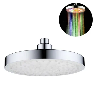 A close-up of a modern LED shower head with water flowing, showing colorful lights.