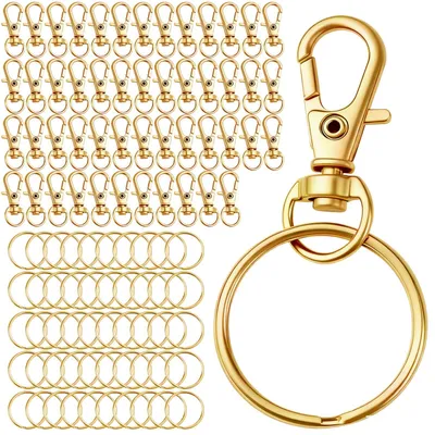 Produktbild von 100 Schlüsselanhänger mit Karabiner und Drehgelenk (goldfarben)