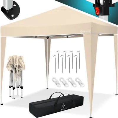 A beige pop-up gazebo with accessories laid out around it.