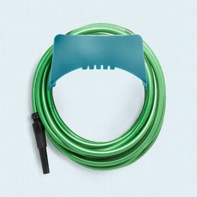 Imagen del producto de Soporte de pared para manguera de riego y accesorios