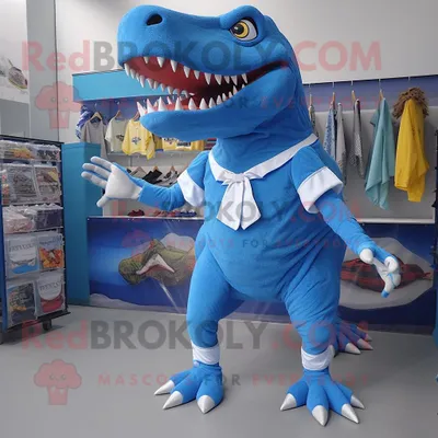 Productafbeelding van Karakter van het blauwe Tyrannosaurus mascotte REDBROKOLY kostuum gekleed met een wikkelrok en schoenclips